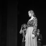 photograph: three people on a stage in a theatre during a rehearsal