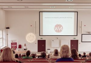 Generic image of a lecture hall filled with people during an event at the Faculty of English