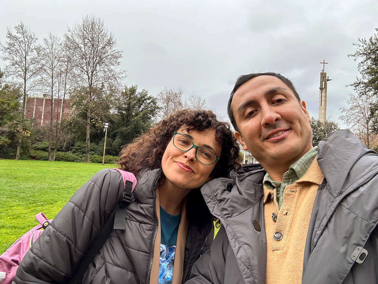 photograph: two persons pose for a photograph