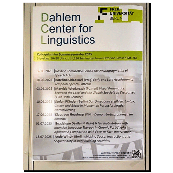 photograph: poster with a conference programme listing the talk discussed in the article