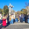 photograph: group of more than ten people in a square in Ponań named after Adam Mickiewicz