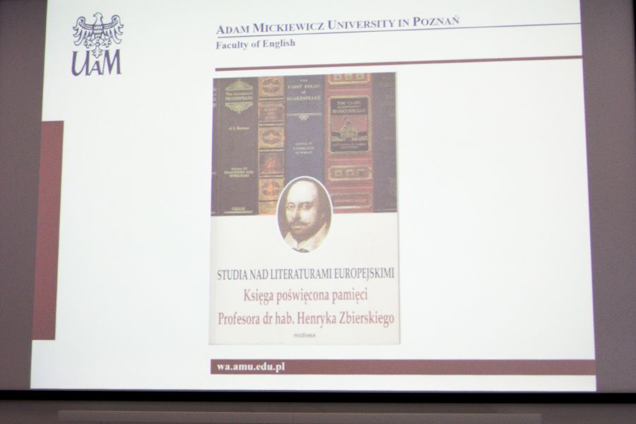 photograph: screen on which a slide is being displayed: book cover