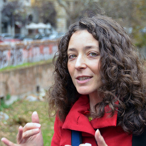 photograph of Jennifer Scappettone with the background of Monte Testaccio, Rome
